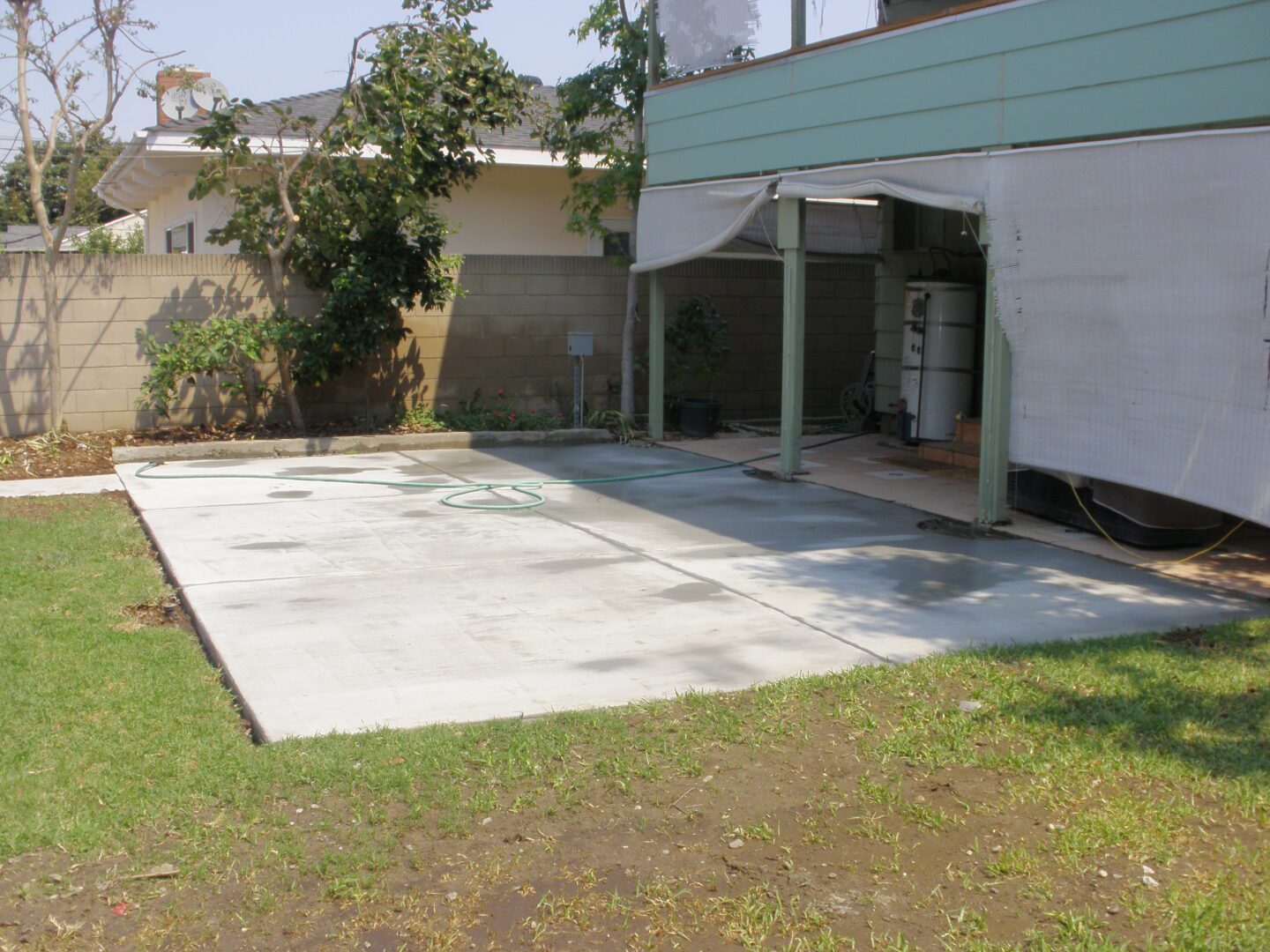 A concrete slab that has been laid in the ground.