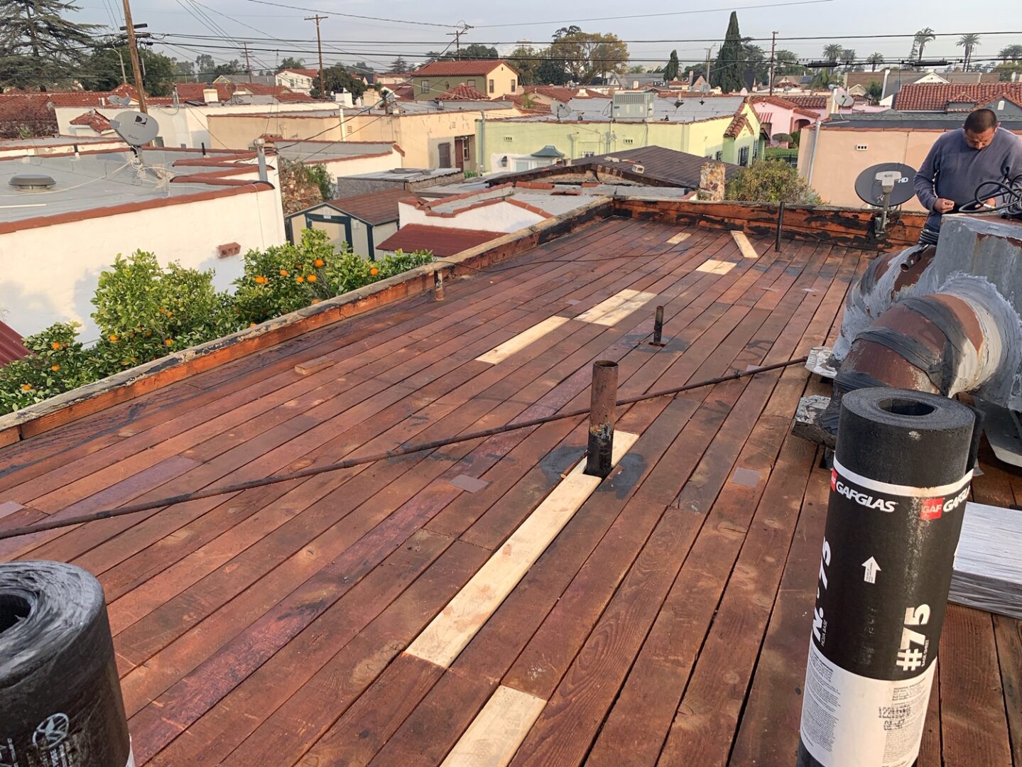 A roof with wooden planks on it