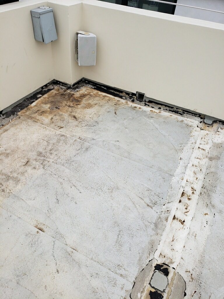 A bathroom floor that has been removed and is being redone.