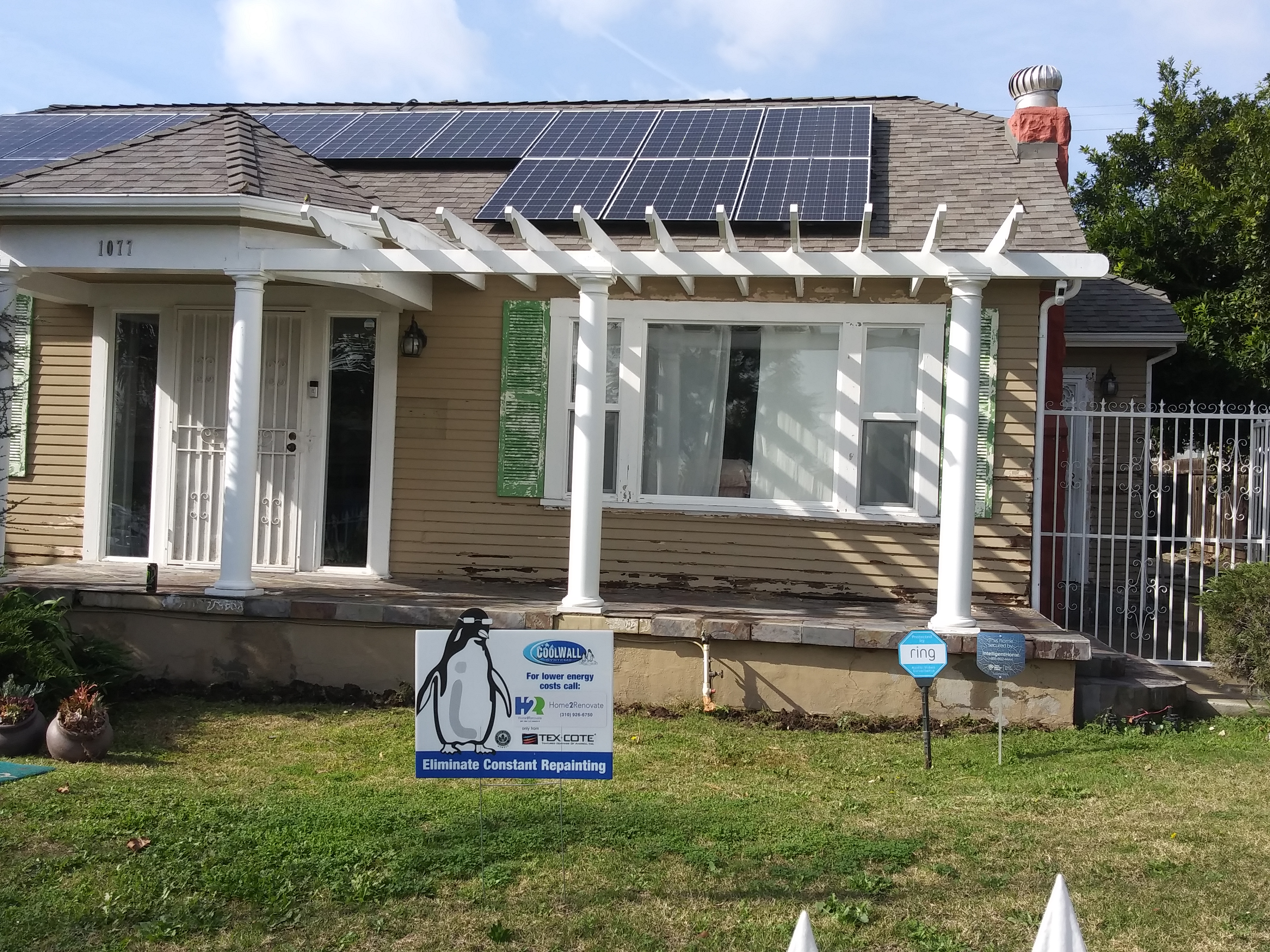 A house with solar panels on the roof.