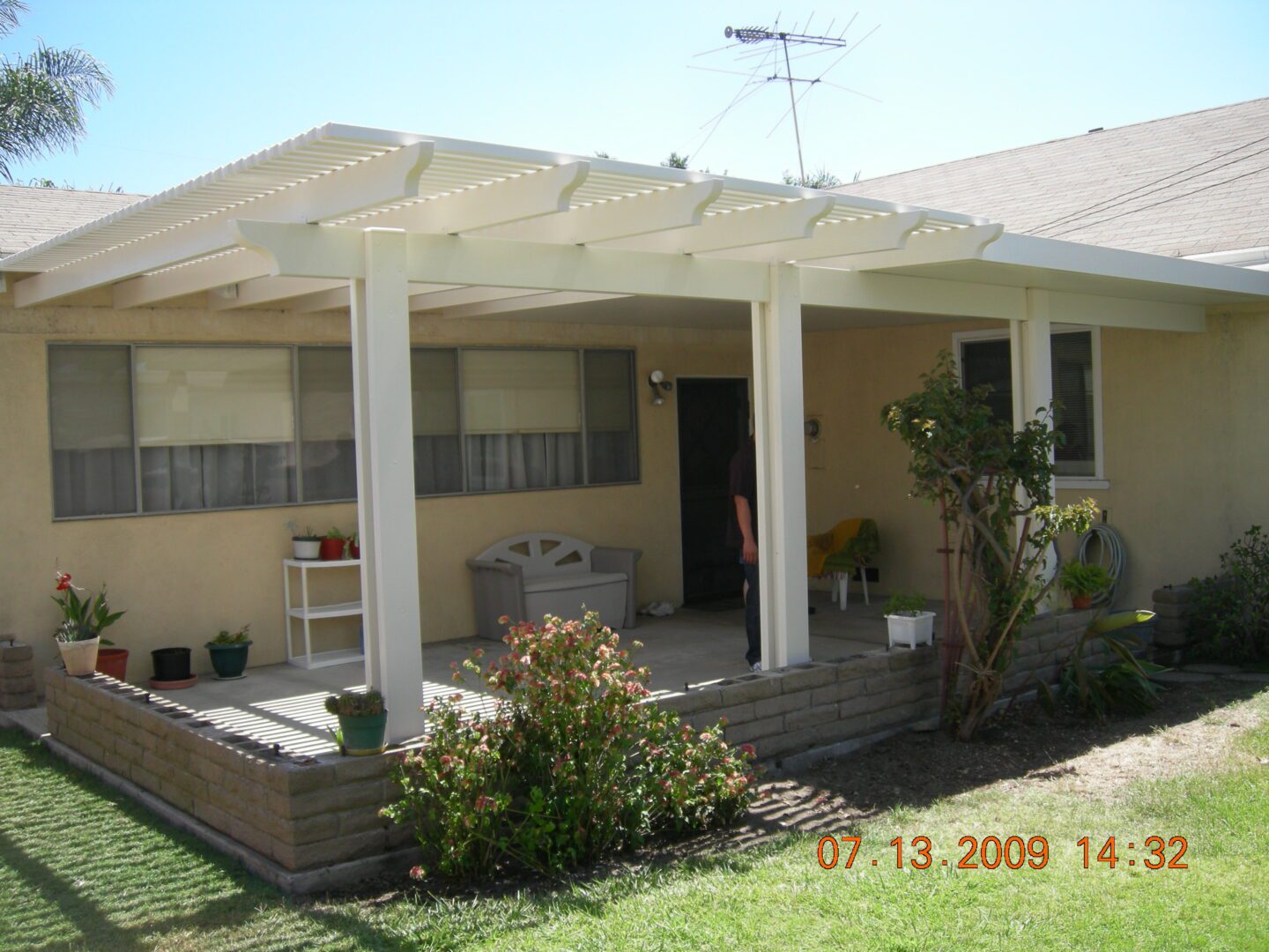 A house with a porch and patio in it