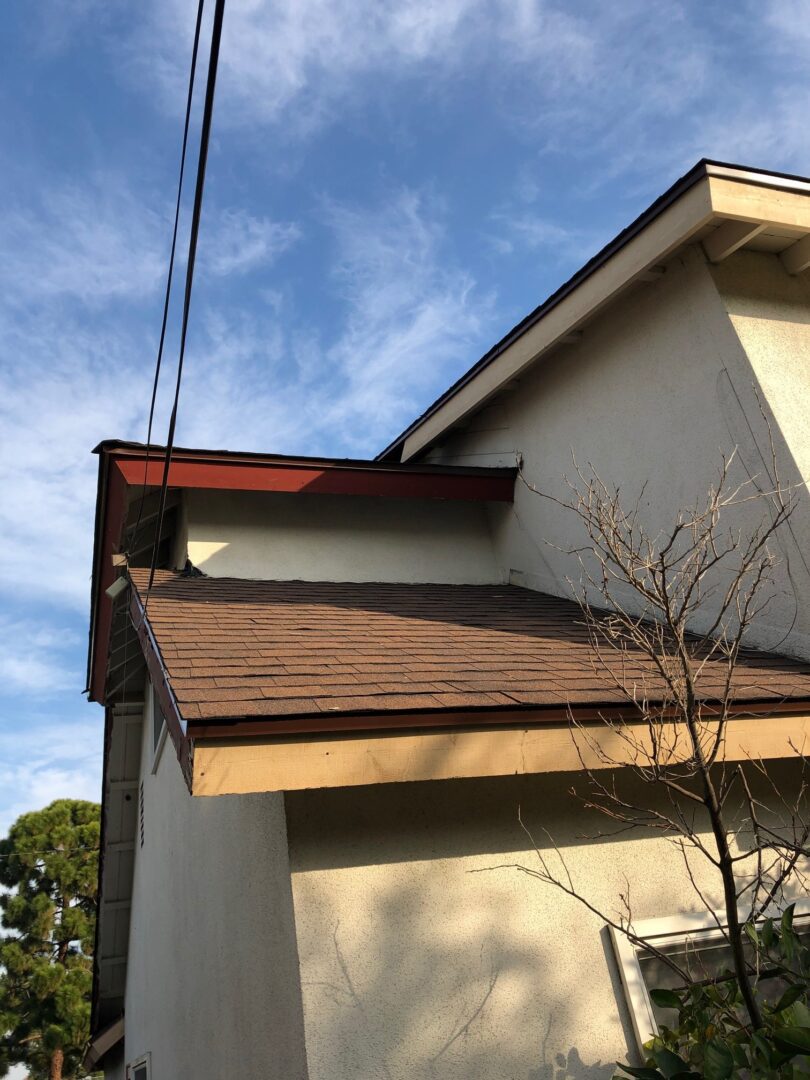 A brown roof with a red line on it