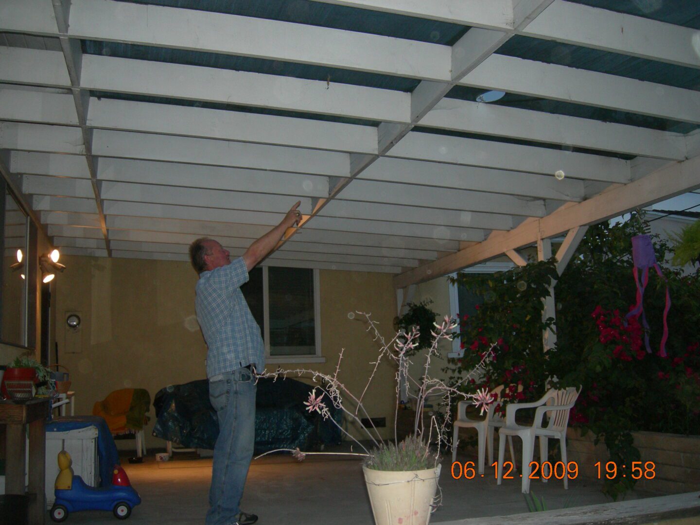 A man standing in the middle of an open room.