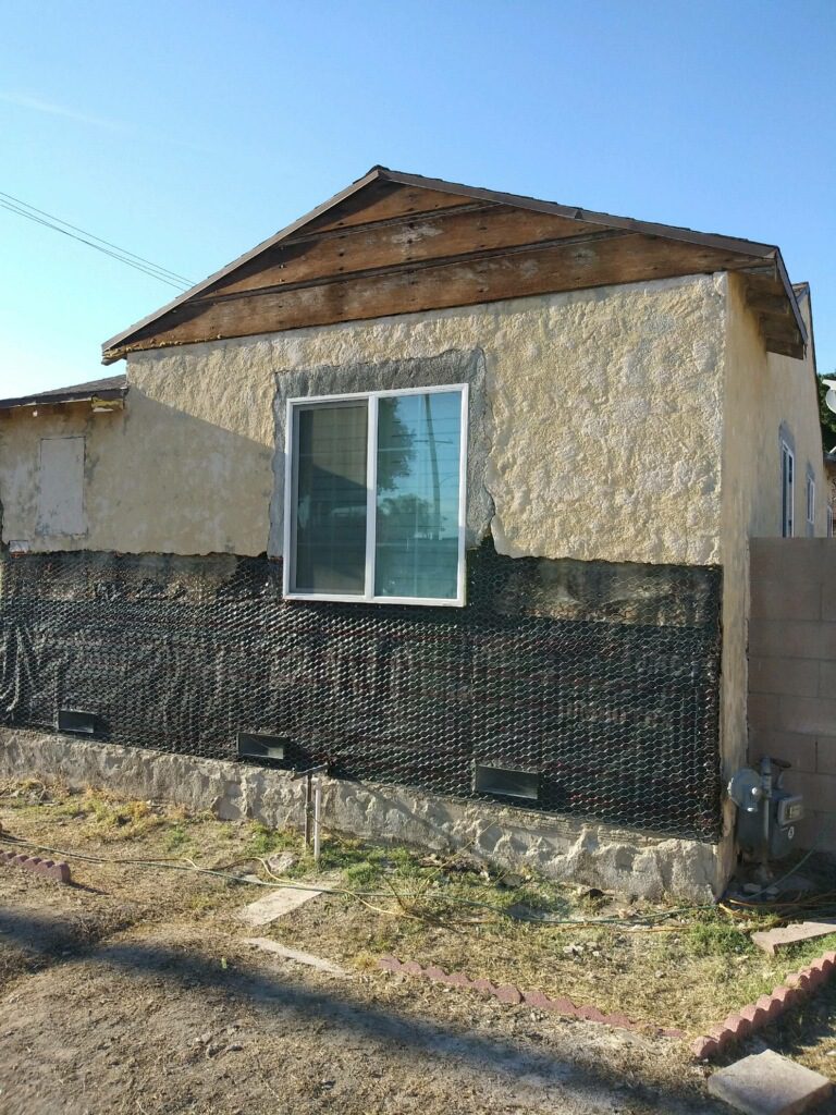 A house with a window and door in it