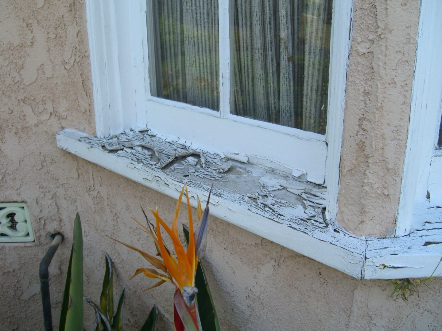 A window sill that has been broken in half.