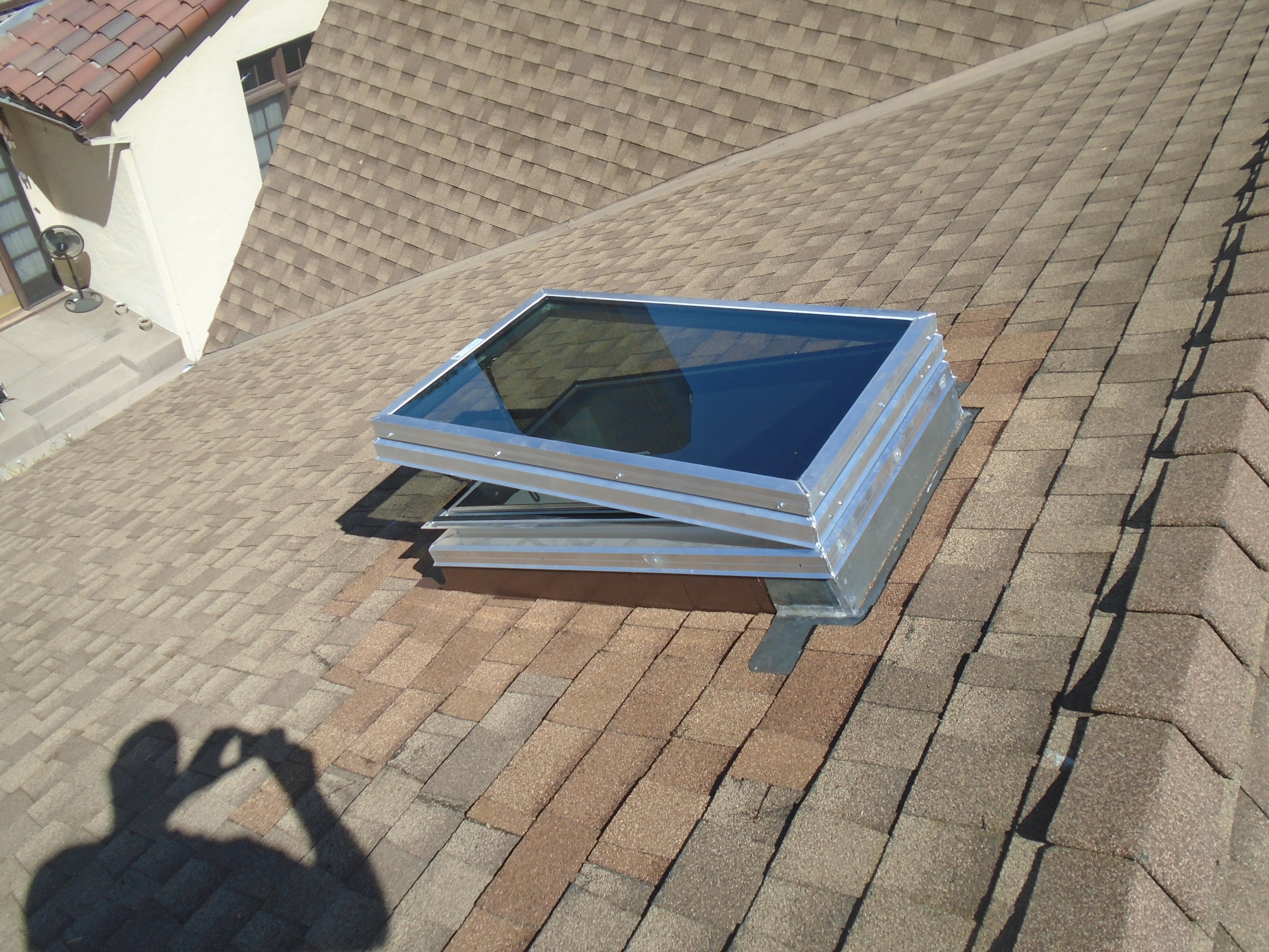 A skylight on the roof of a house