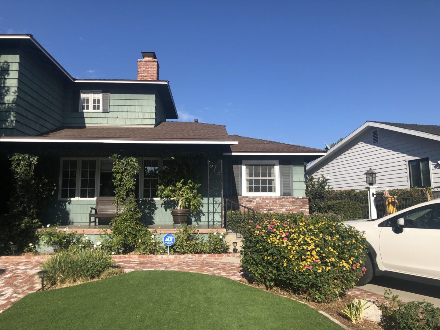 A house with a lawn in front of it