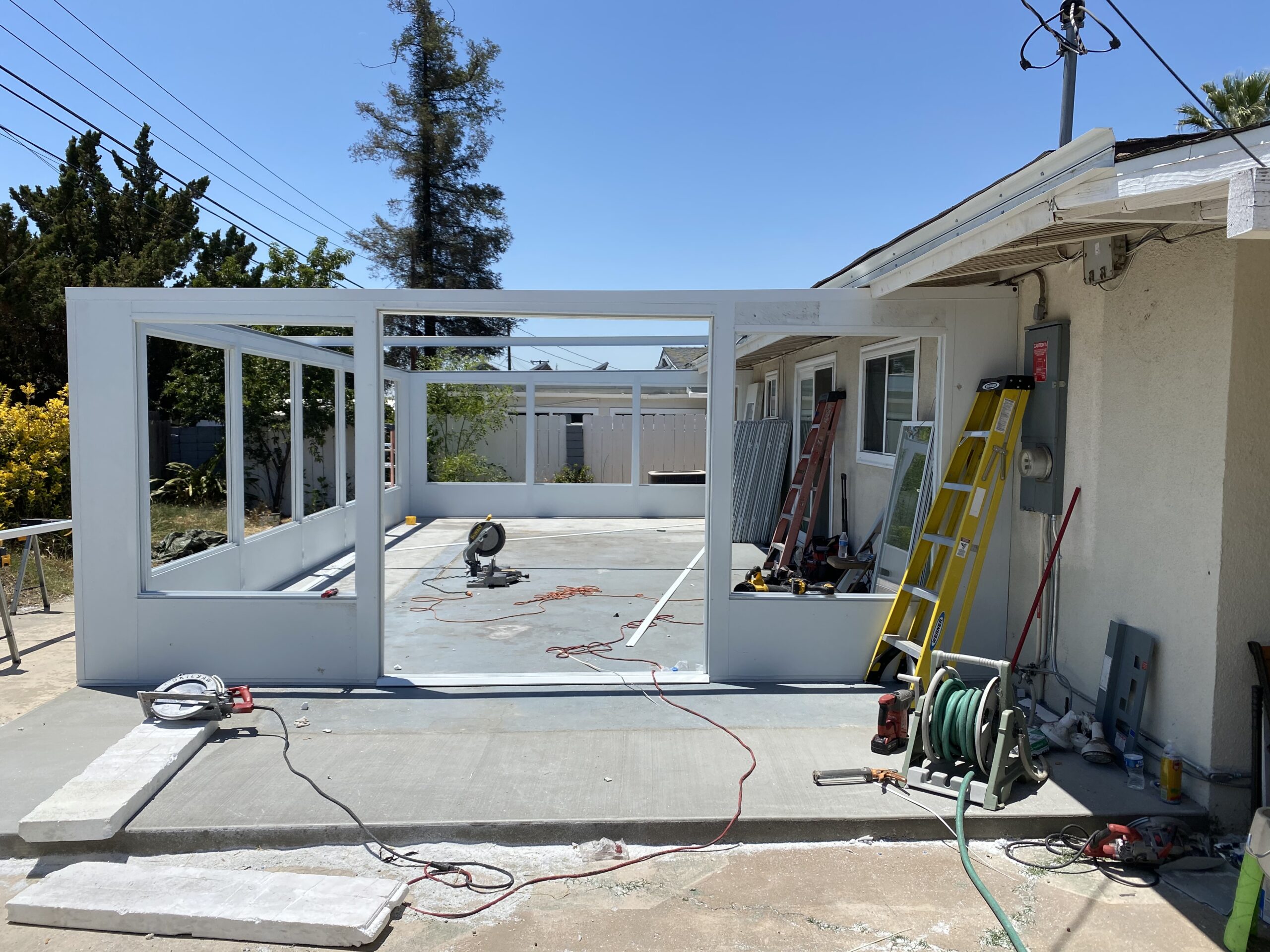 A house being remodeled with the door open.