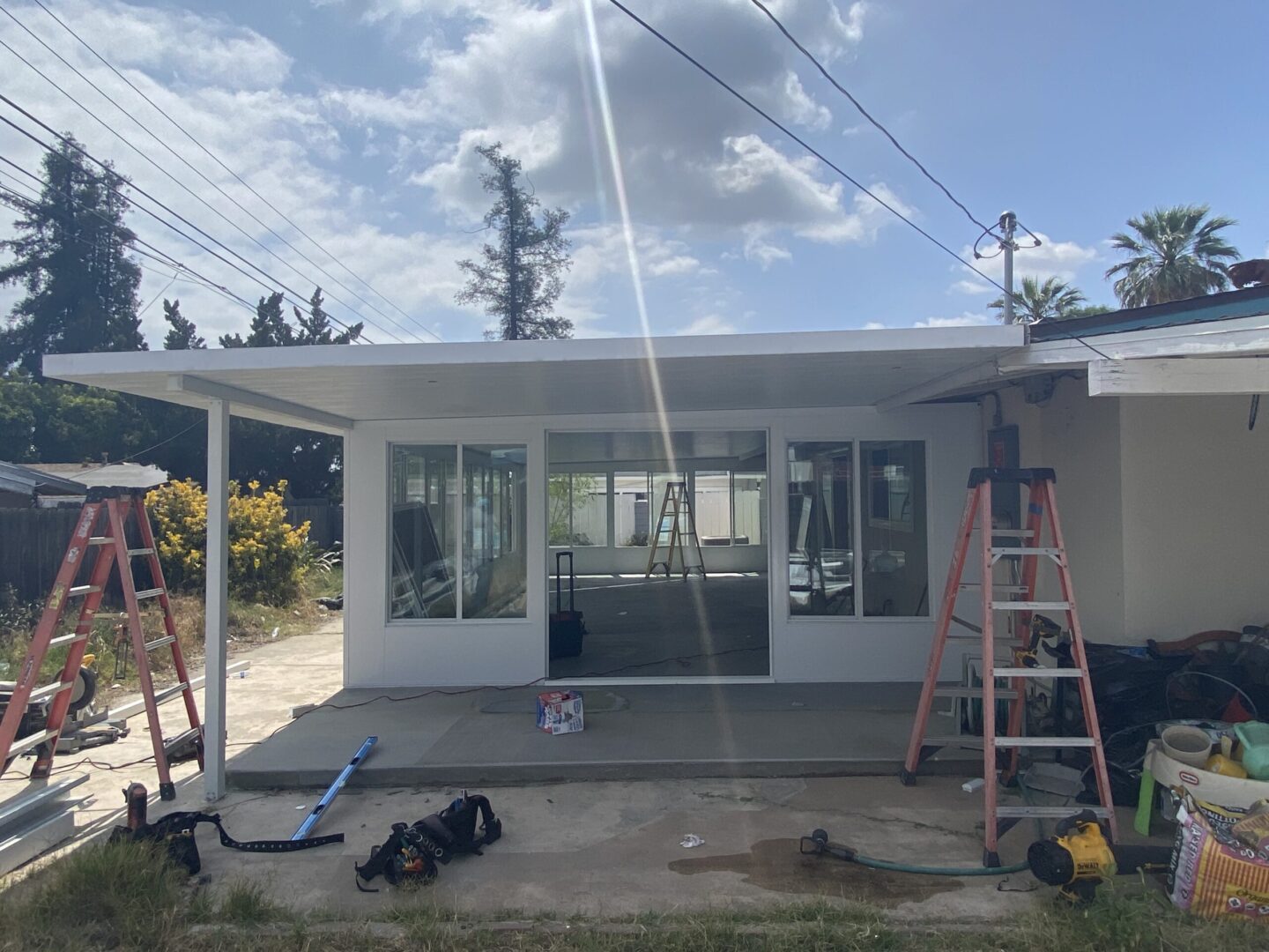 A house being built with some people working on it